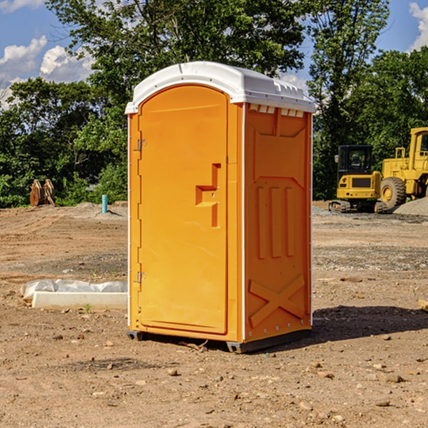 how often are the portable restrooms cleaned and serviced during a rental period in Holmes